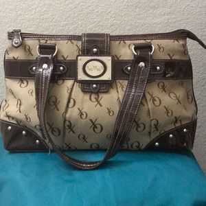 Brown woman Purse xoxo is in good condition